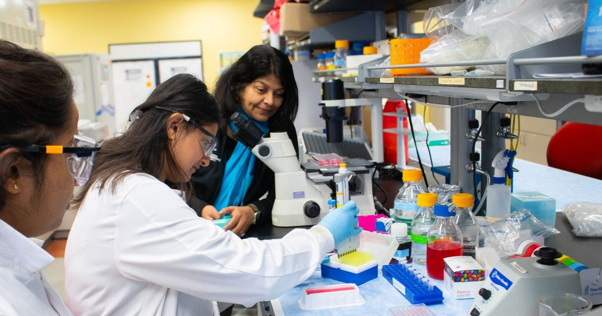 (From left) Graduate students Ruwanthika Kularathna, Neeti Gandhi, and Robert E. Hord Jr. Professor of Chemical Engineering Padma Rajagopalan conduct a biological measurement. Photo by Hailey Wade for Virginia Tech.