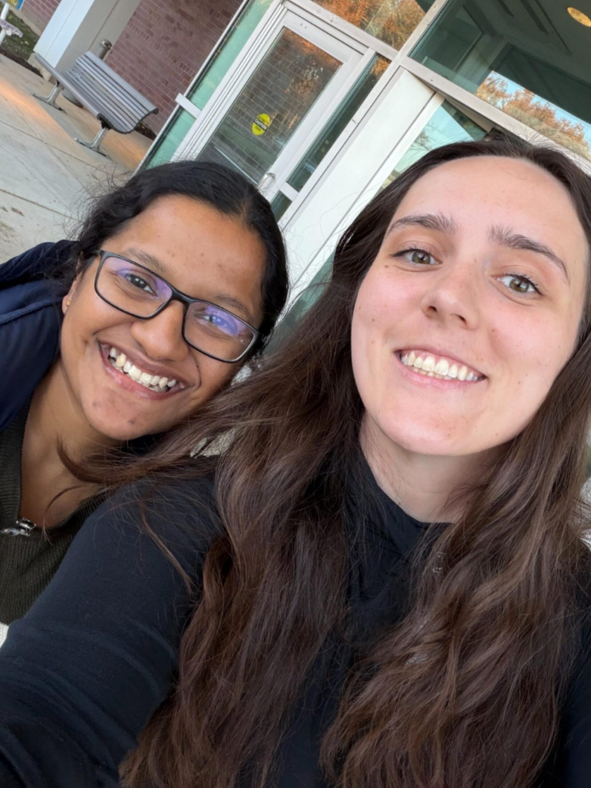 Photo of Blessy Antony and Kateland Sipe at NIAID Bioinformatics Research Center AI Codeathon